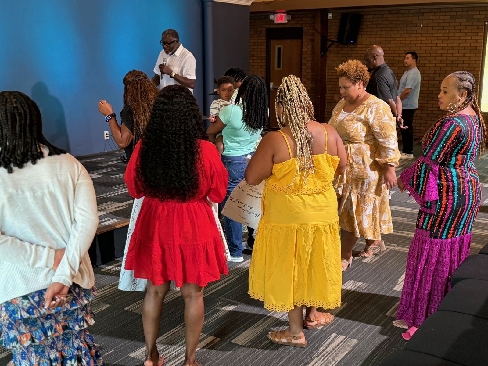 Members gathered at the front of the sanctuary for prayer